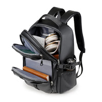 Sac pour voyage noir avec grand compartiment principal et poches frontales structurées.