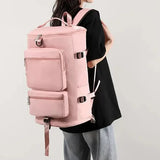 Sac à dos de voyage 29x29x49 cm porté sur le dos par un adulte