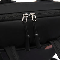 Détail du sac à dos professionnel montrant le tissu Oxford et les finitions jacquard